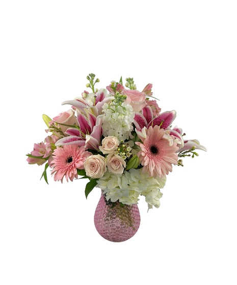 Beautiful shades of pink and white in a pink vase perfect for mom.